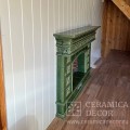 Каминный портал зеленого цвета с открытой топкой в коллекции Птички.