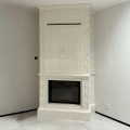 Каминная топка АСТОВ ПС 8063 в облицовке для классического камина в коллекции Тюльпан.