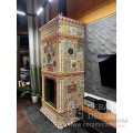 Каминная топка Астов ПС 5574 в облицовке изразцами с росписью по сказам Бажова