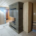 Каминная топка ROMOTOP IMPRESSION L 2G L 83.60.34.21 в облицовке изразцами коллекции Универсал.