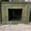 Классический камин зеленого цвета с банкетками и каминной топкой Астов ПП 8857.
